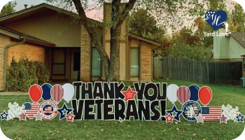 yard love sign Thank You Veterans! in black letters with red white and blue balloons and stars