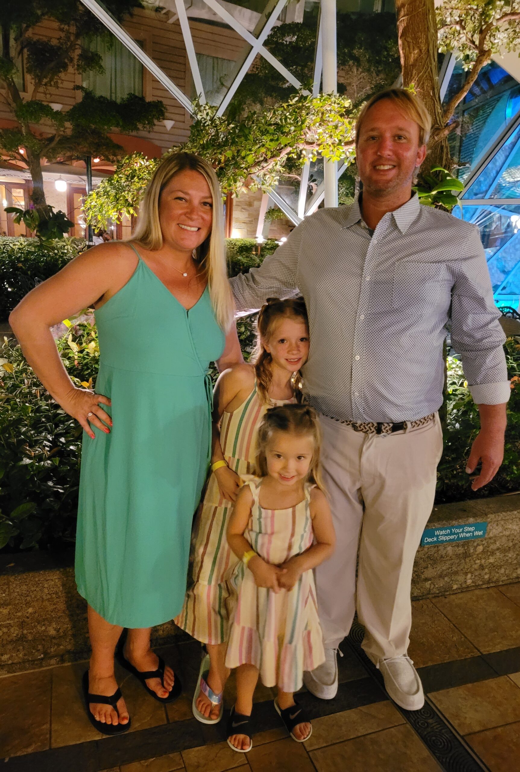 Lindsey Yoder, husband and two daughters - Yard Love Brevard