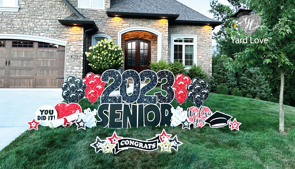 2023 senior graduation yard signs in black and red