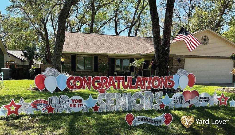 Congratulations Seniors yard love sign in red and silver glitter letters with balloons and stars