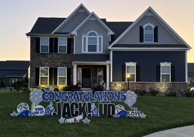 Congratulations Jack! UD - You Did it - sparkly blue and silvers with Black Name - graduation caps, balloons, We Love You, MAscot, stars and diploma