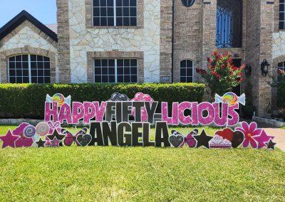 Yard Sign in Sparkly bright Pink and Black - Happy Fifty-Licious Angela - with stars, flowers, butterflies, crown, balloons and lollipops